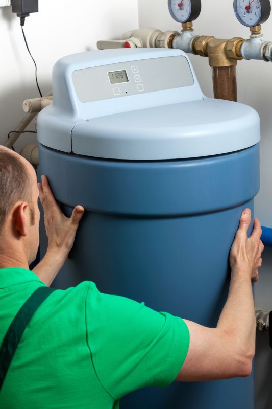 Plumber Installing Water Softener